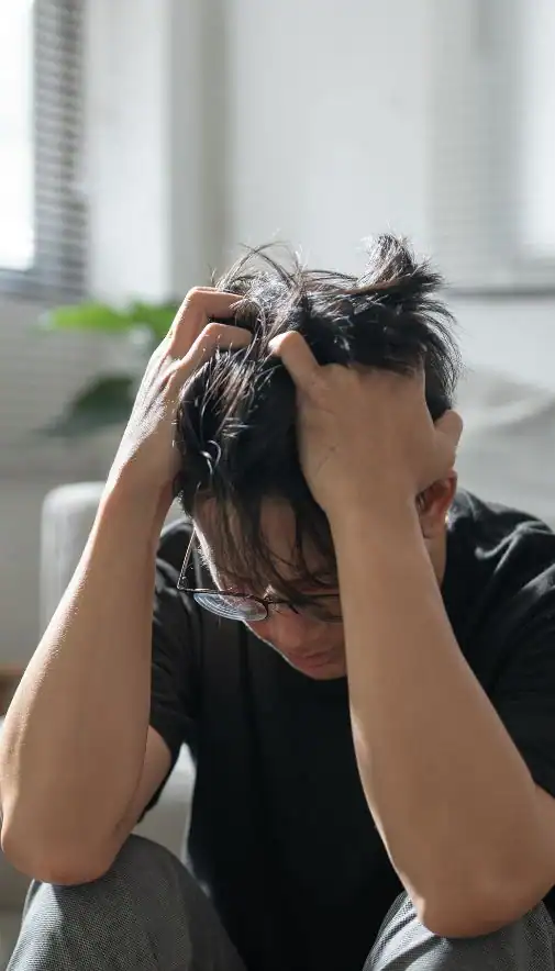 Image of upset man because of erectile dysfunction symptoms Stockport