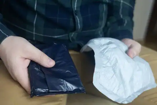 image of man holding stool incontinence Stockport products